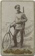 Vyro portretas prie dviračio