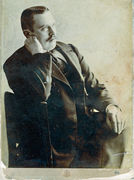 Antanas Tiškevičius (1866–1920), sėdintis krėsle